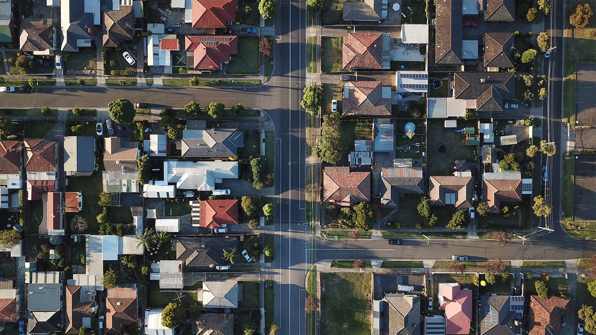 an aerial view of a neighborhood of houses
